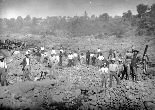 pictures of gold rush miners. Working river gravels near